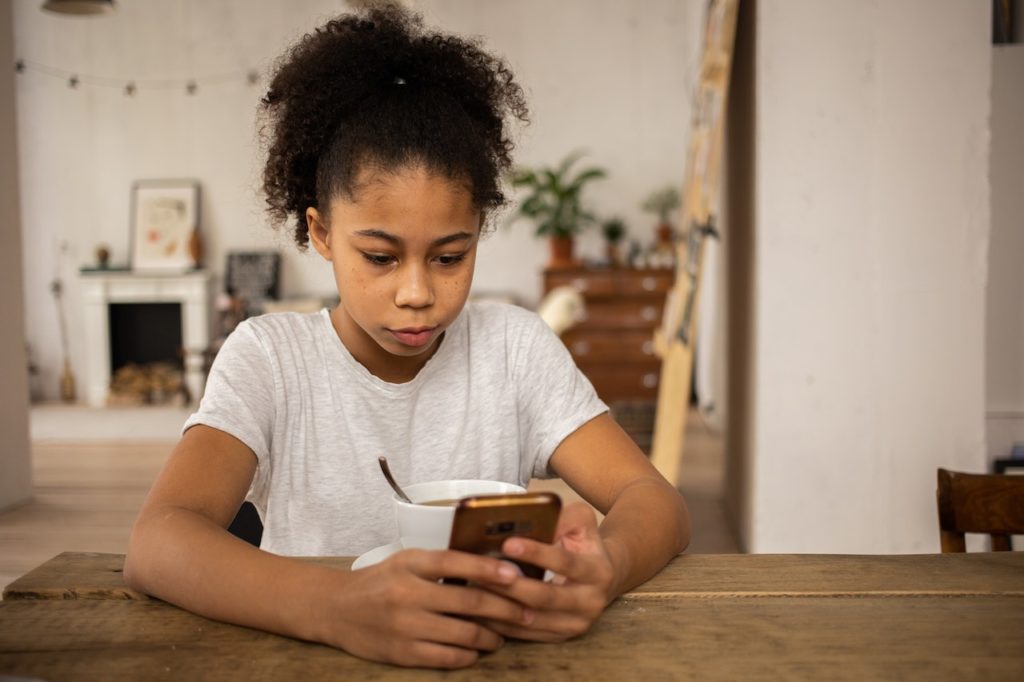 Teen using mobile